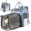 cat inside of large, blue, foldable pet carrier/backpack with mesh extension compartment